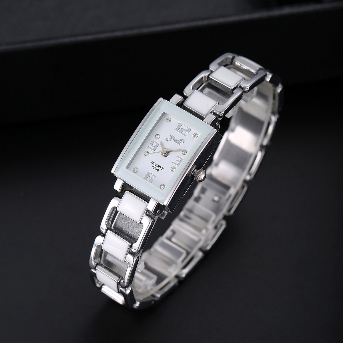 Diamond bracelet watch case close-up